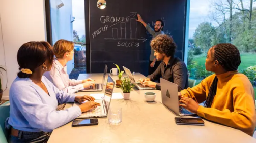 depositphotos_712539480-stock-photo-well-lit-modern-office-group